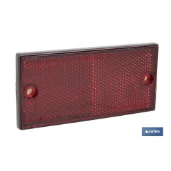 CATADIÓPTRICO RECTANGULAR ROJO 106 X 50 MM CON AGUJERO SIN TORNILLO CON ADHESIVO