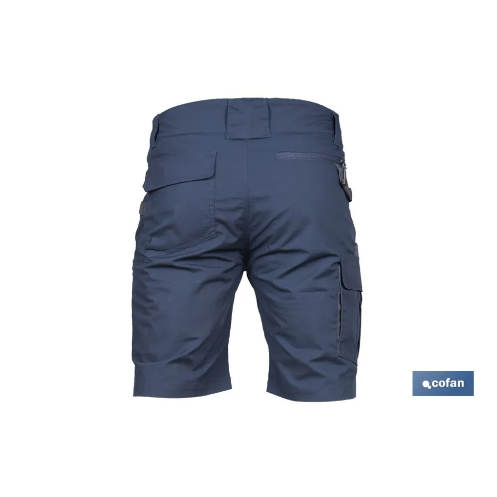 BERMUDAS DE TRABAJO TYR ELASTANO 215 G/M2 AZUL MARINO CON DETALLES GRISES TALLA 46