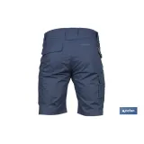 BERMUDAS DE TRABAJO TYR ELASTANO 215 G/M2 AZUL MARINO CON DETALLES GRISES TALLA 60