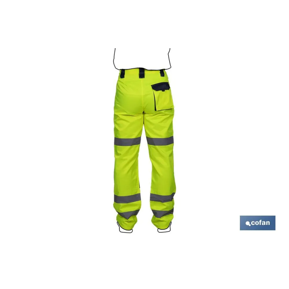 PANTALÓN DE ALTA VISIBILIDAD MODELO SIRIO AMARILLO Y AZUL MARINO TALLA M