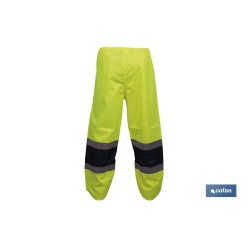 PANTALÓN DE LLUVIA DE ALTA VISIBILIDAD MODELO BELLATRIX AMARILLA Y AZUL TALLA S