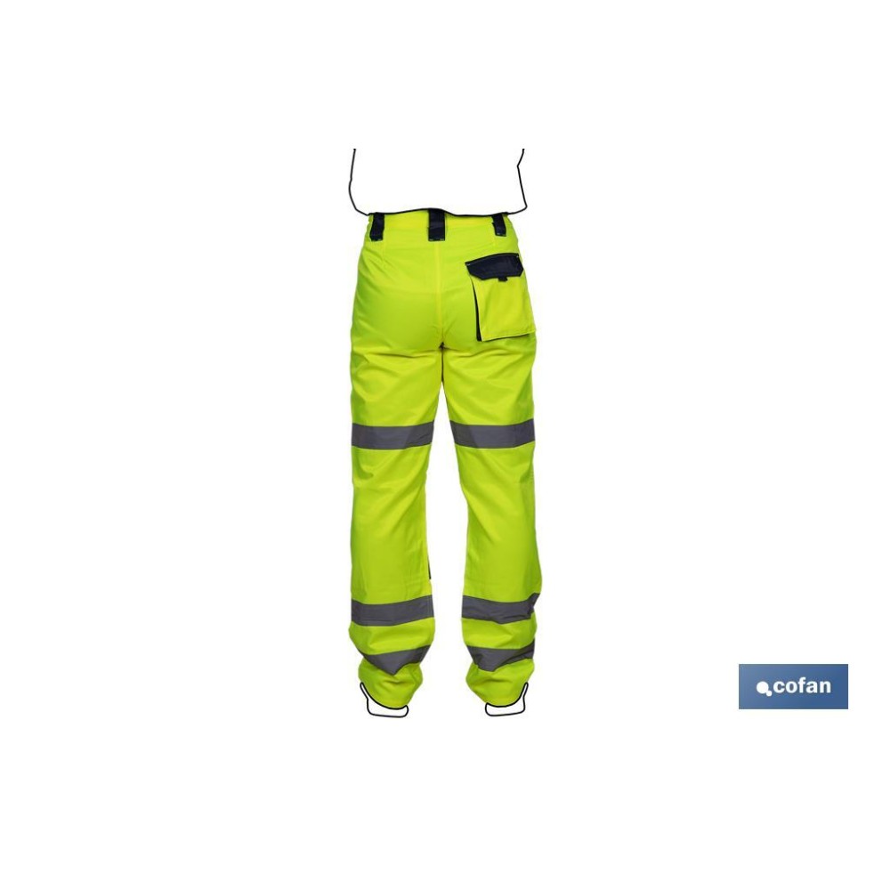 PANTALÓN DE ALTA VISIBILIDAD MODELO SIRIO AMARILLO Y AZUL MARINO TALLA M