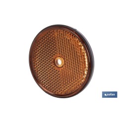 CATADIÓPTRICO REDONDO ÁMBAR Ø60 MM CON AGUJERO SIN TORNILLO
